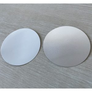 Aluminum foil lid seal paperboard