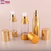 Gold airless cosmetic bottle