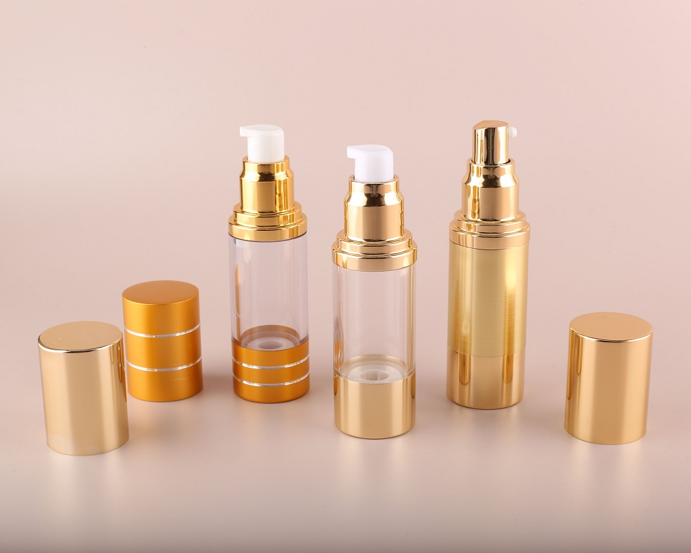 Gold airless cosmetic bottle